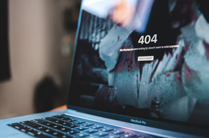 sample 404 page on screen of a macboor air