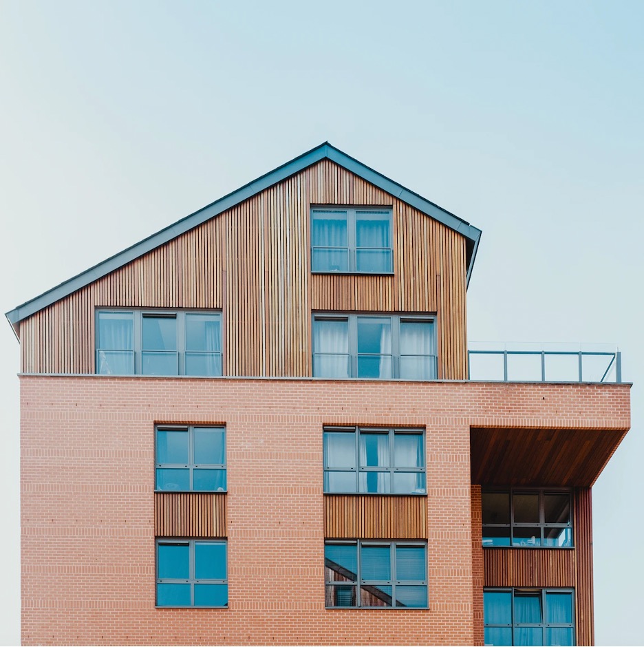 low angle photo of brown house
