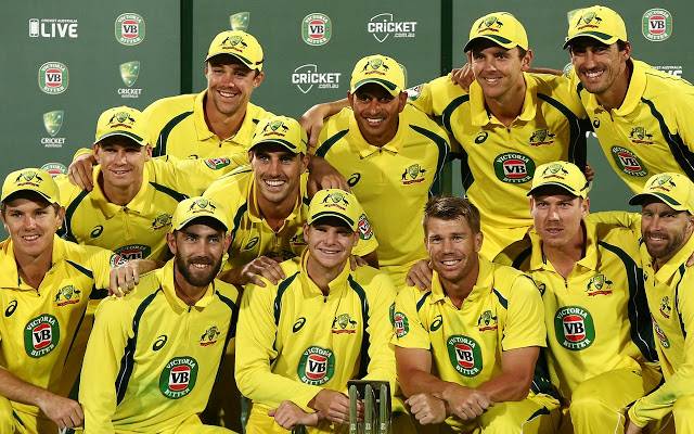 cricket team in yellow uniforms